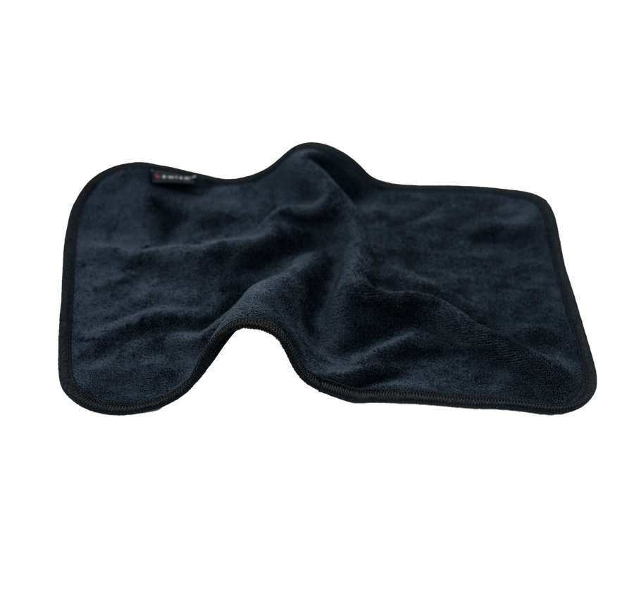A soft black after-sex towel ready for Post-Intimacy clean-up.