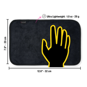 A soft black after-sex towel showing its dimensions and weight, ready for Post-Intimacy clean-up.